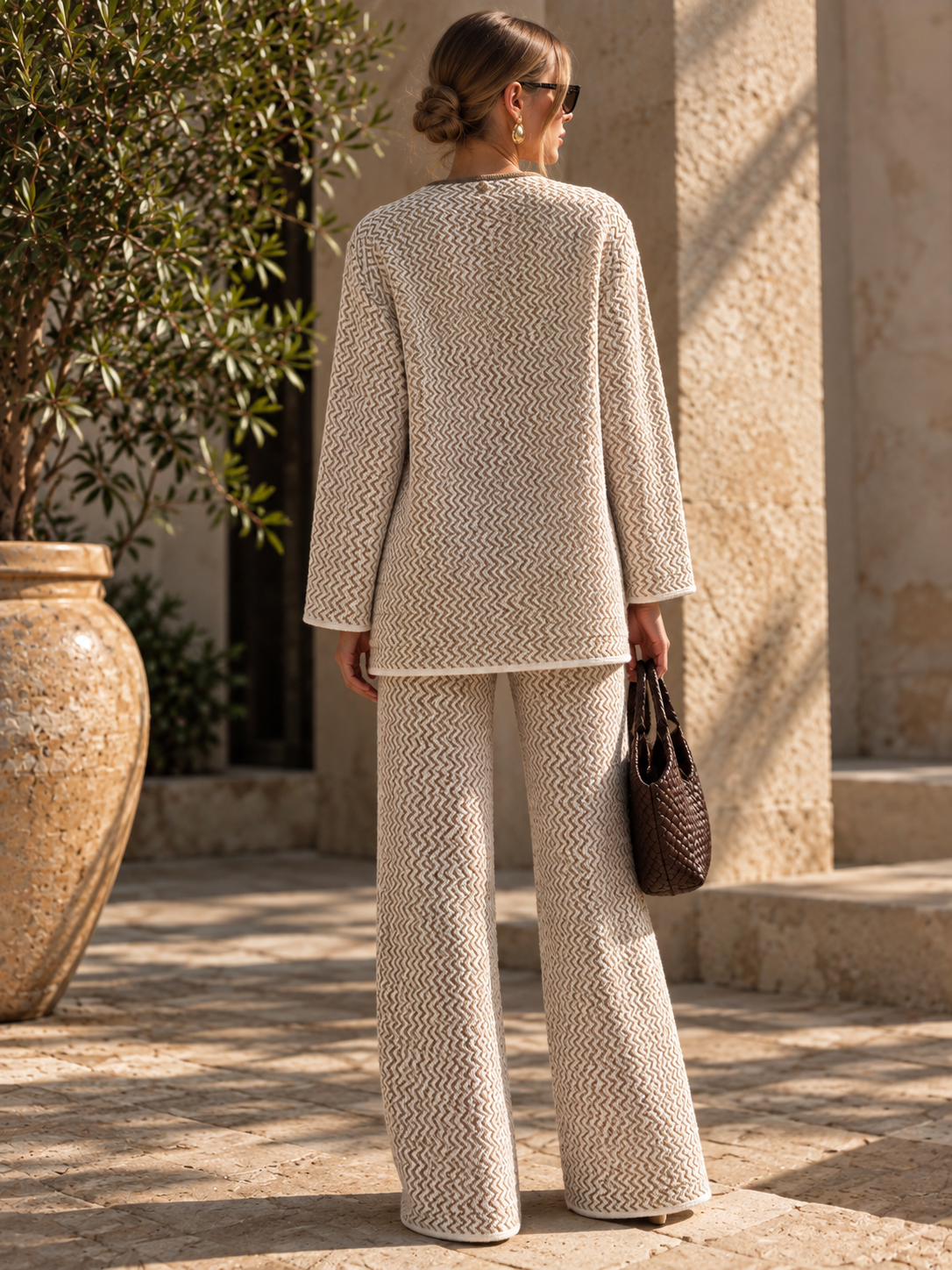 Back view of The Giselle beige knit blouse by PHO Firenze