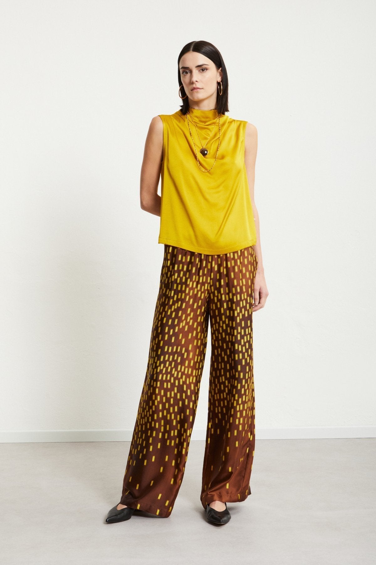 Ottod'Ame brown wide-leg palazzo trousers styled with yellow top