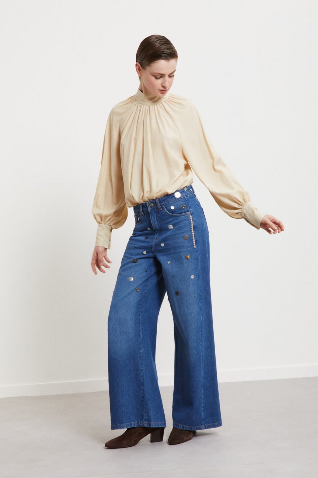 Full-length view of Ottod’Ame blue wide-leg jeans with embroidery