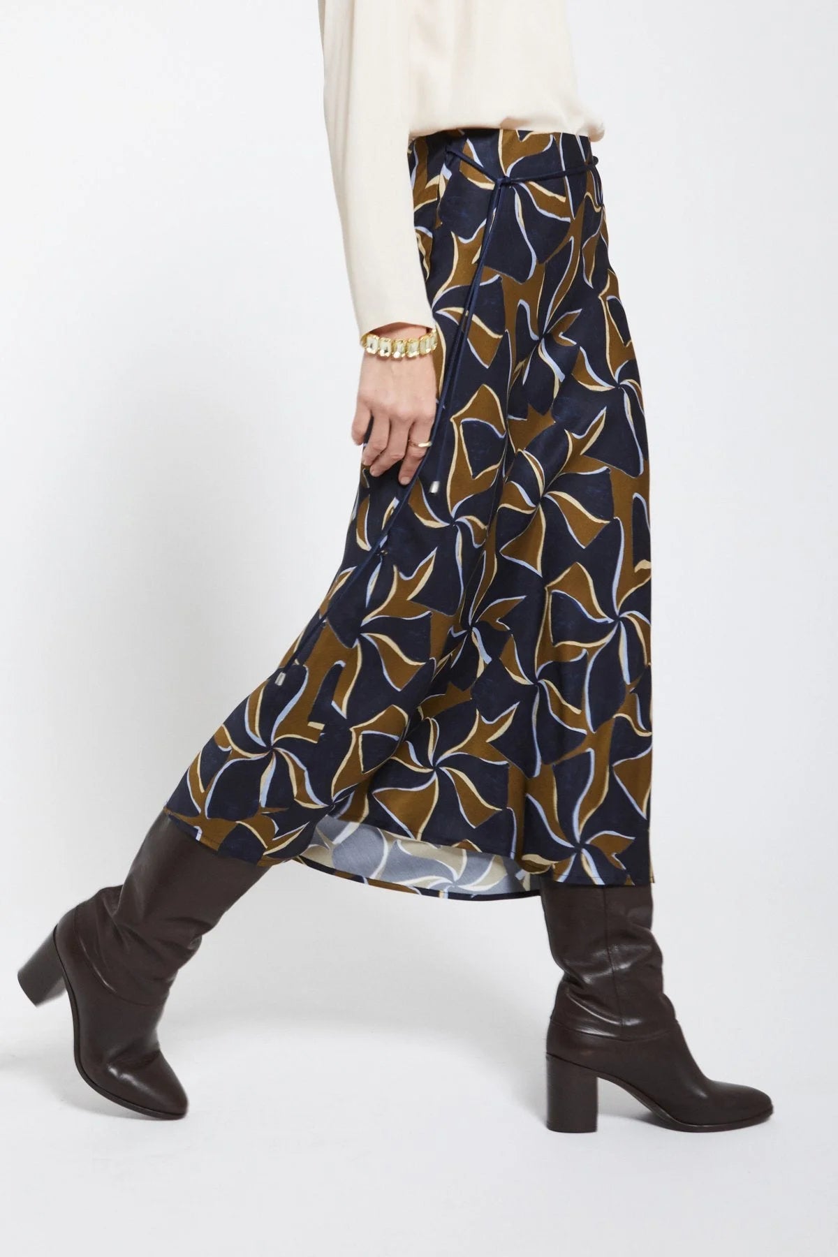 Ottod'Ame navy abstract print A-line midi skirt styled with boots