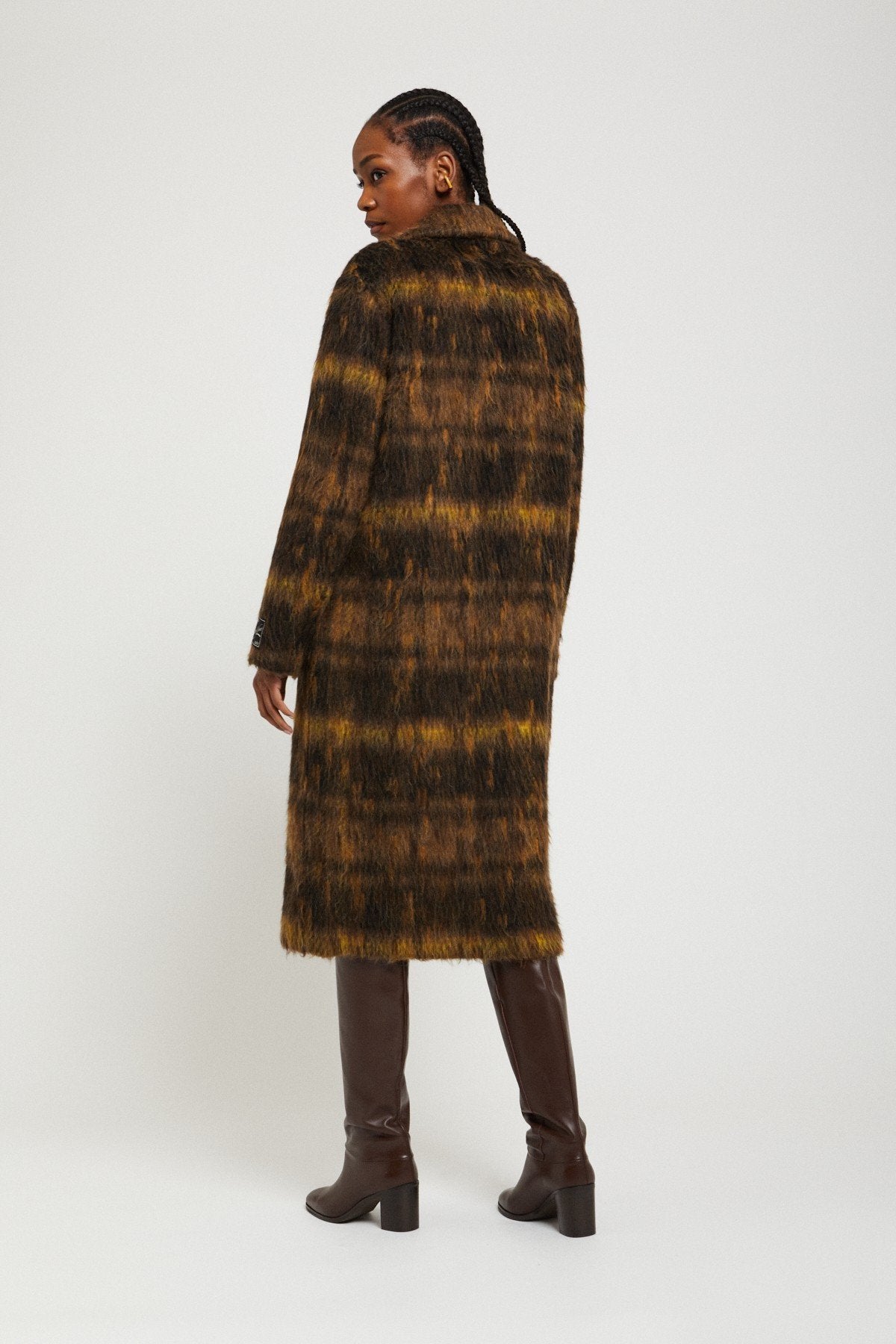 Back view of the Ottod'Ame long plaid coat.
