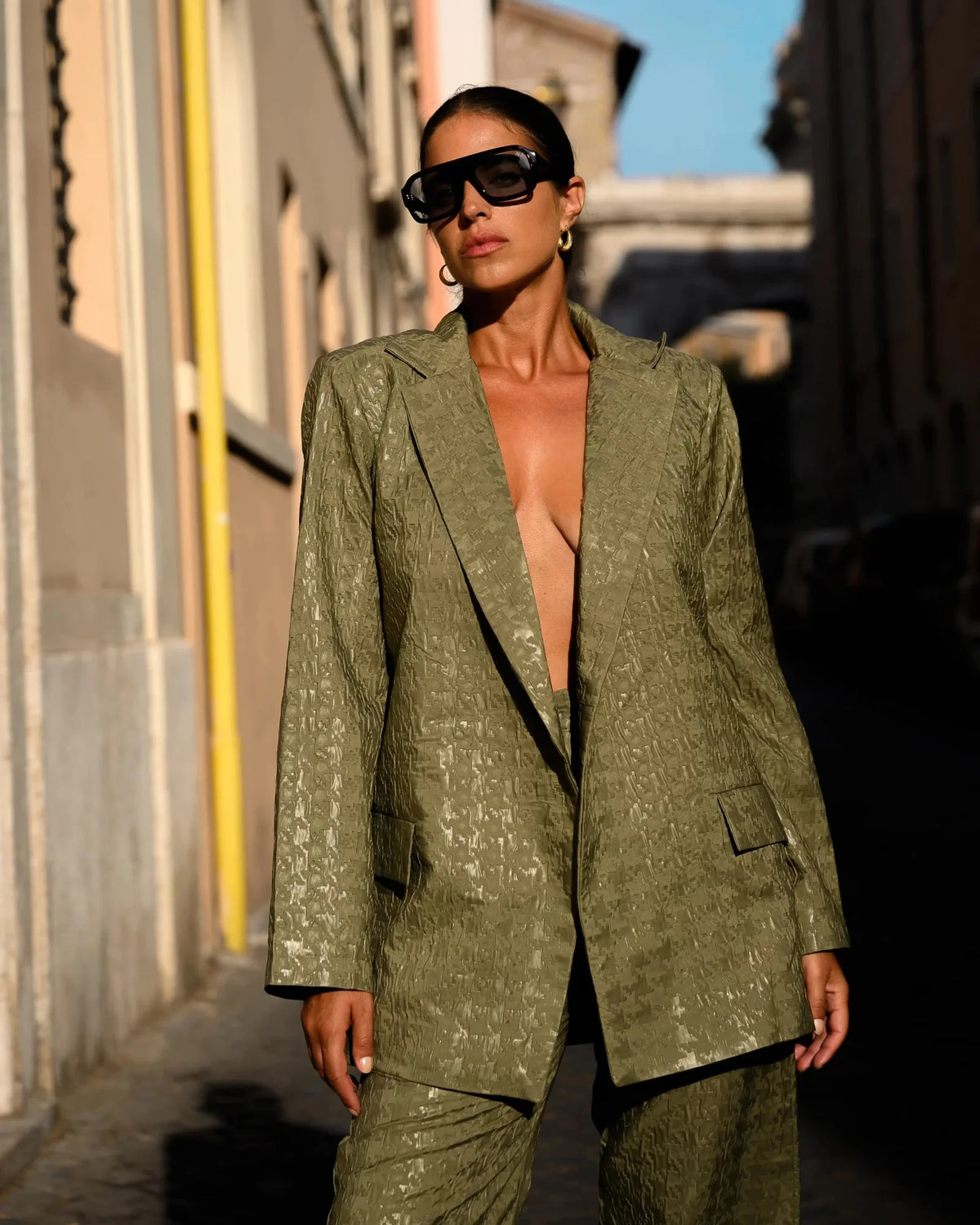 KateJo Collections olive green Tetris print blazer textured fabric close-up