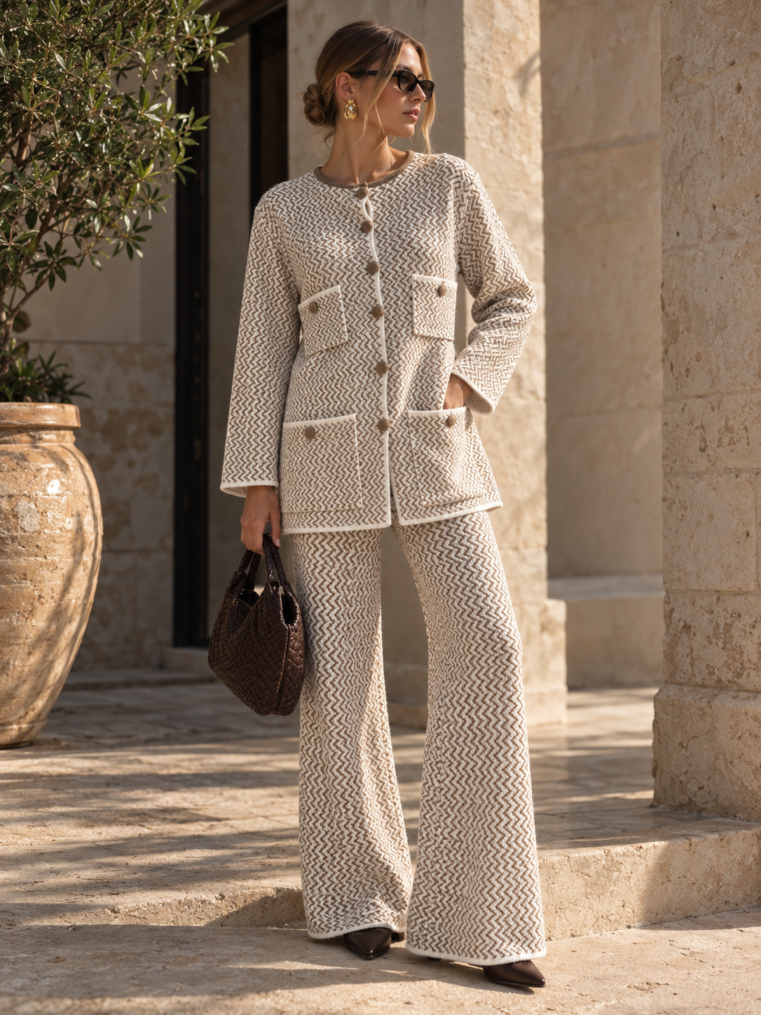 The Giselle beige knit trousers styled as part of the coordinated PHO Firenze set