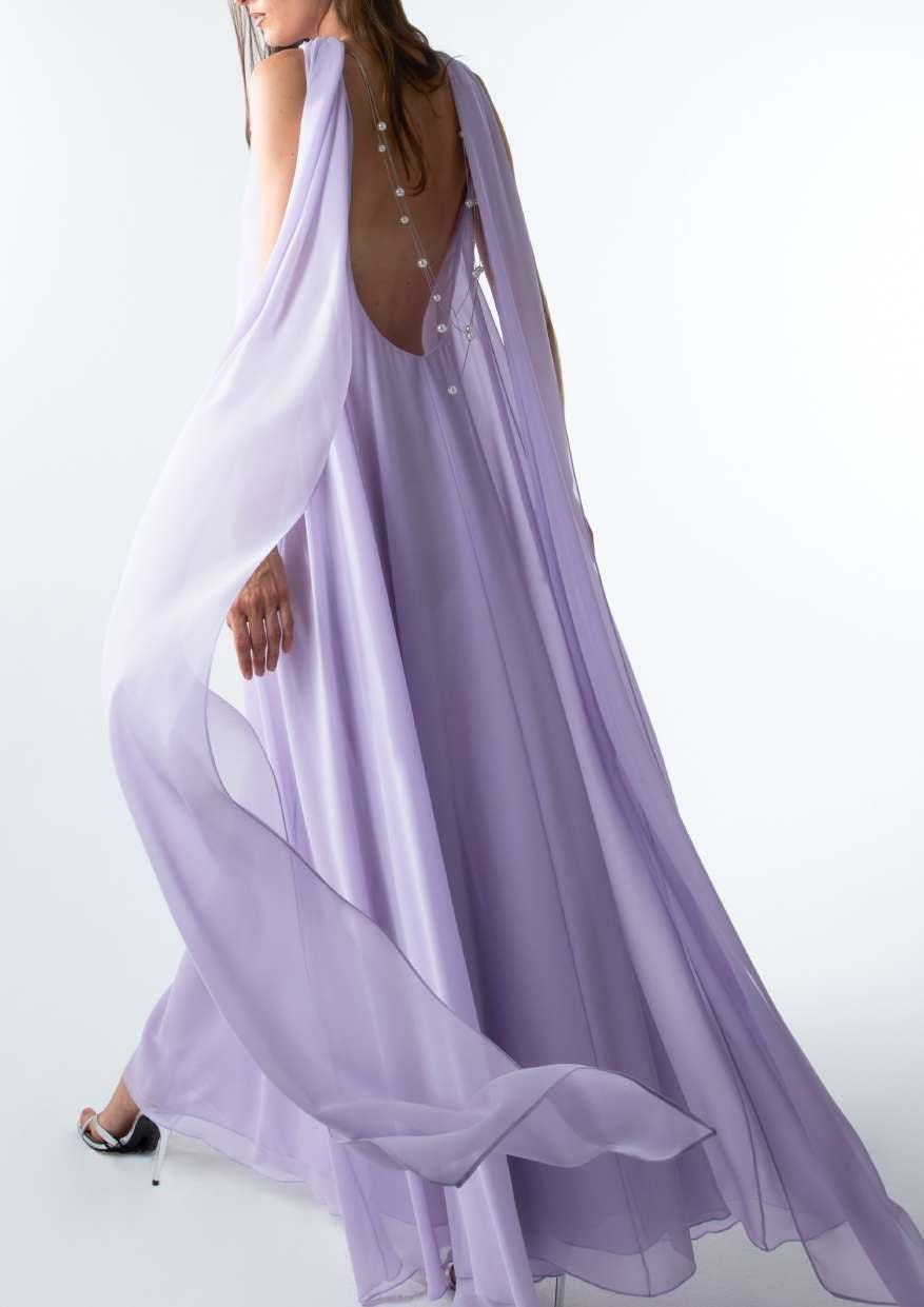 Lavender open back cape maxi dress with flowing sleeves by SOPHiEL