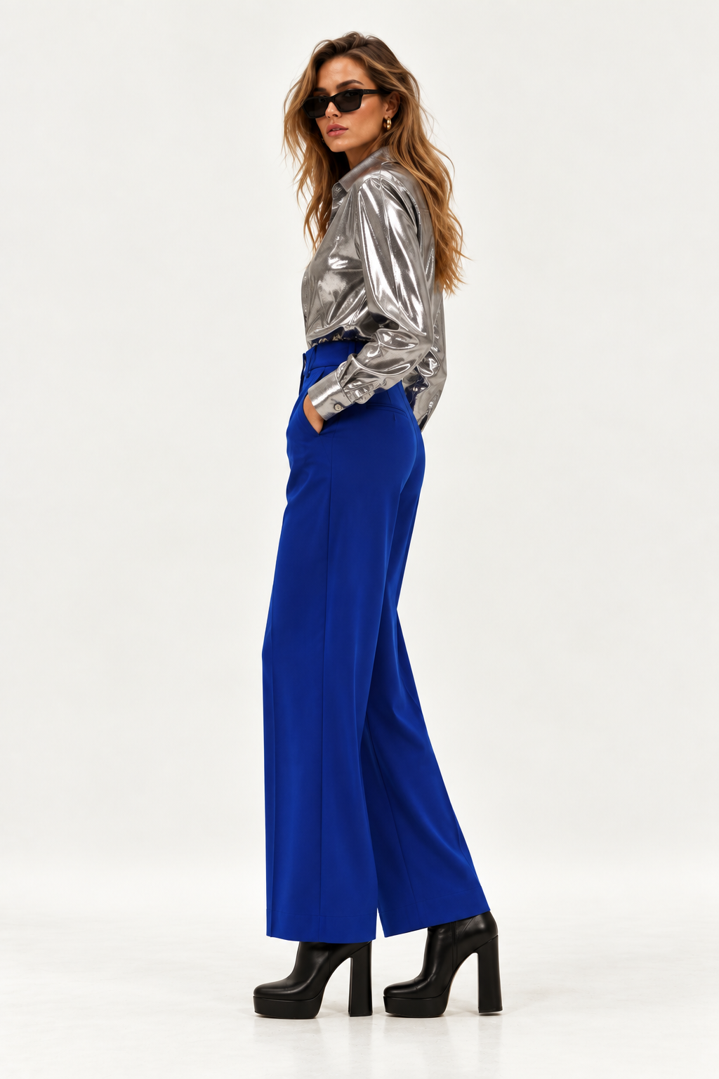 WE_ARE blue high-waist wide-leg trousers side view. SOPHiEL