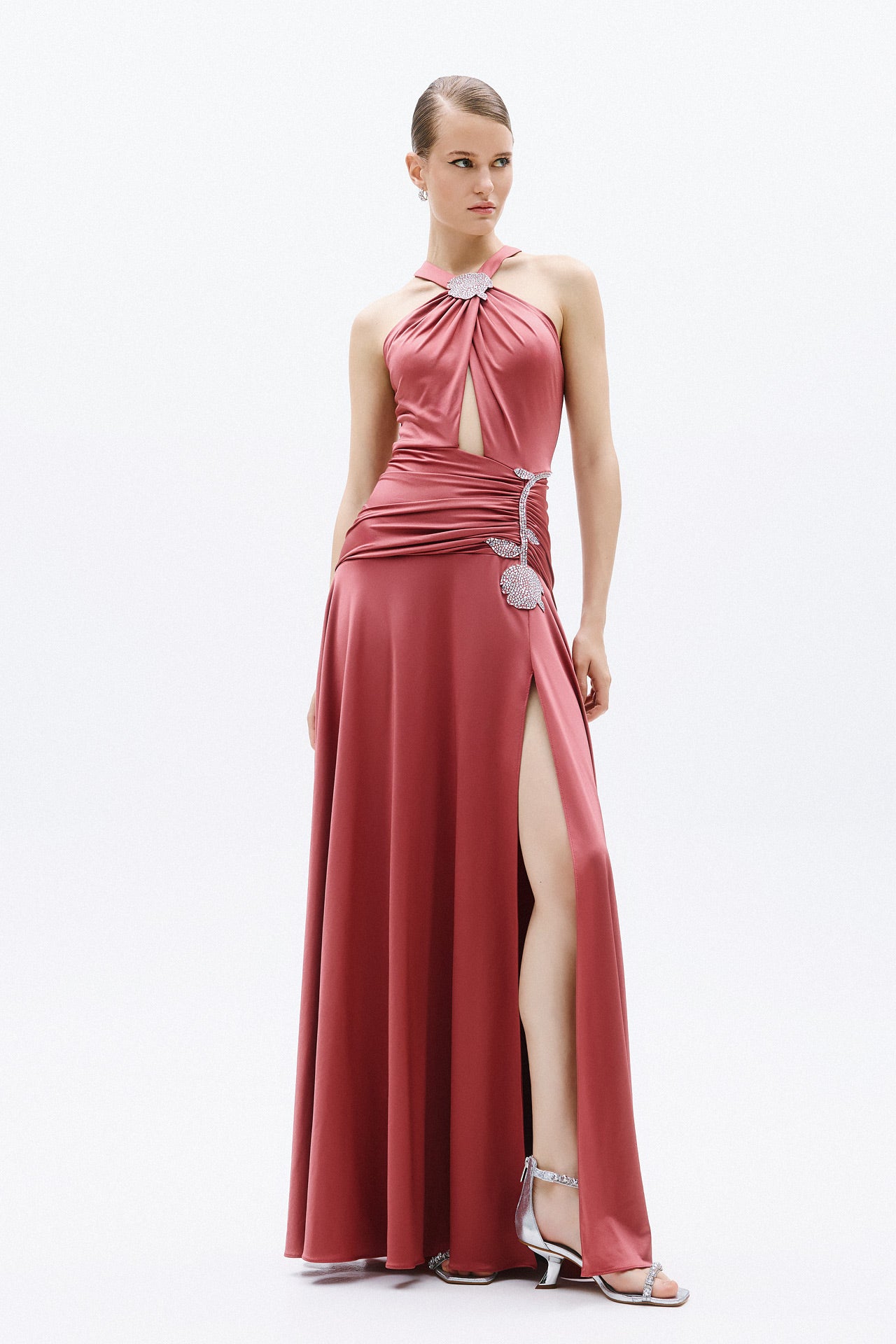 Elegant ruby satin formal gown with draped waist and crystal floral detail