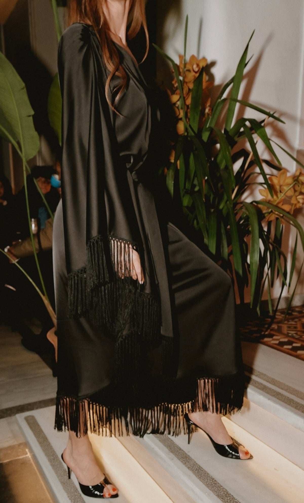 Alma Sanchez Anobi black fringe maxi dress at evening event