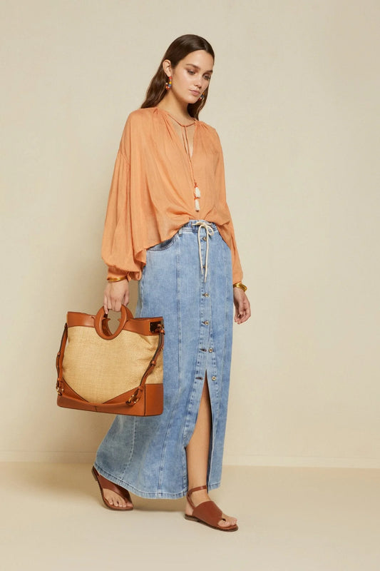 Elegant peach silk blend blouse styled with denim Sophiel