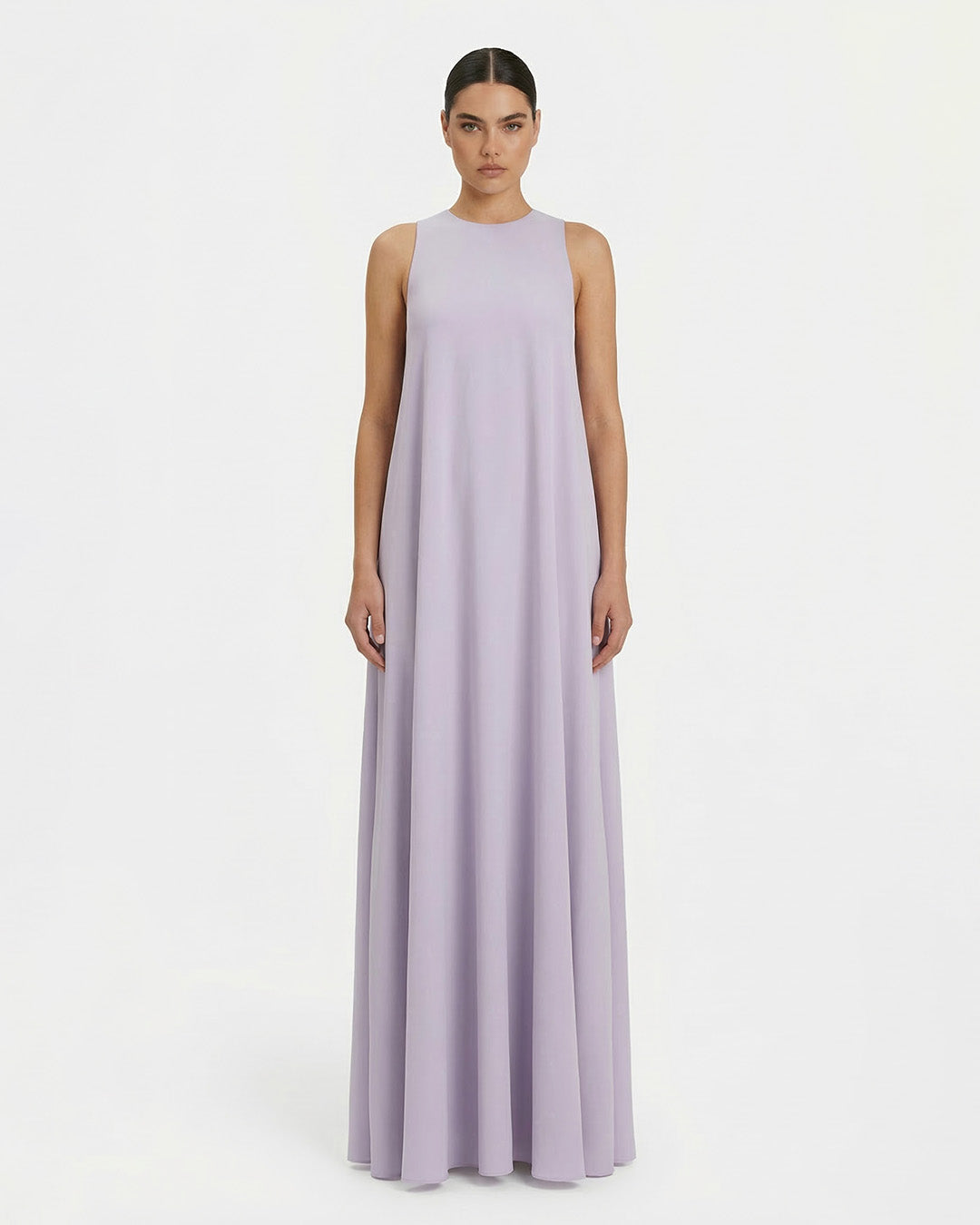 Lavender maxi dress with dramatic cape sleeves and fluid silhouette