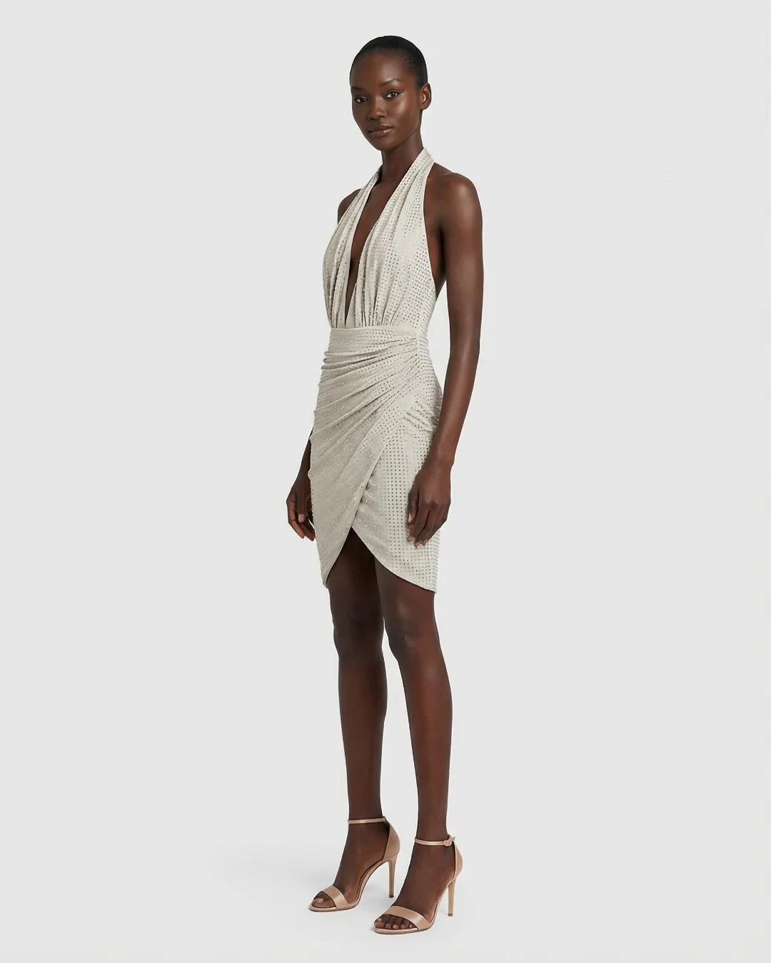 Ivory rhinestone halter mini dress with open back and draped skirt by SOPHiEL